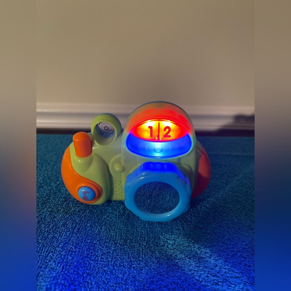 Toddlers Light Up Musical Camera Hap-P-Kid 2010-Works! Near Perfect Condition.